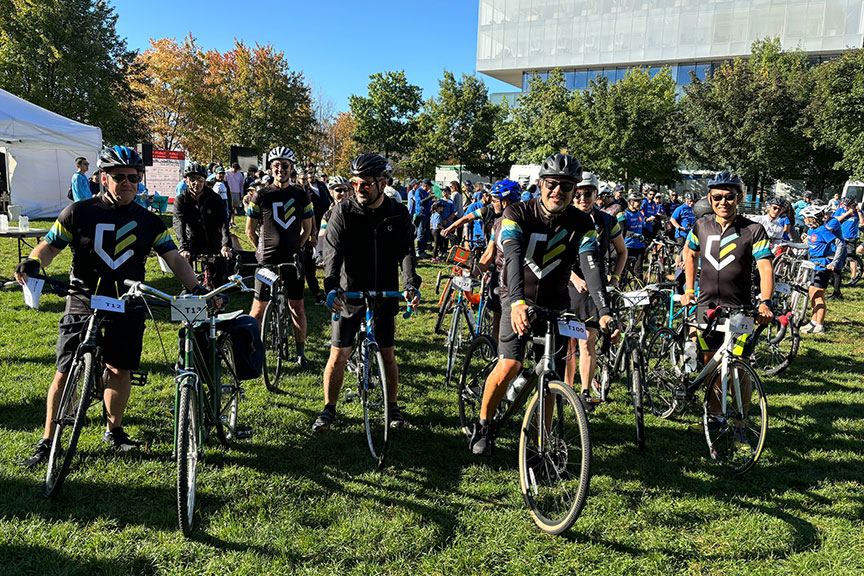 A group of people on a bike outdoors